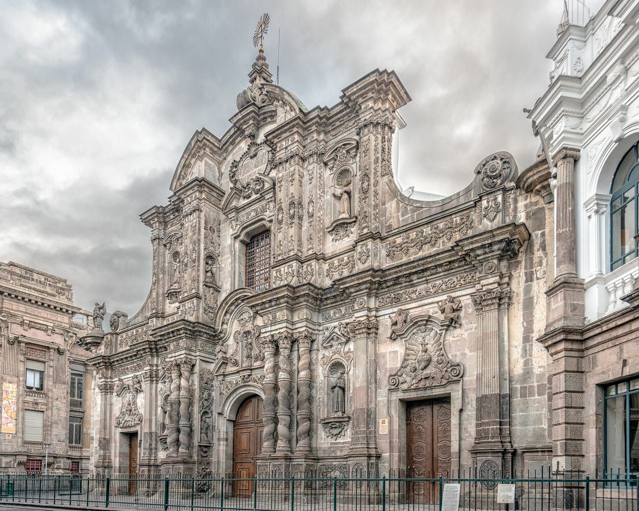 Quito facade of La Compania Jesuit church 6:30 AM
