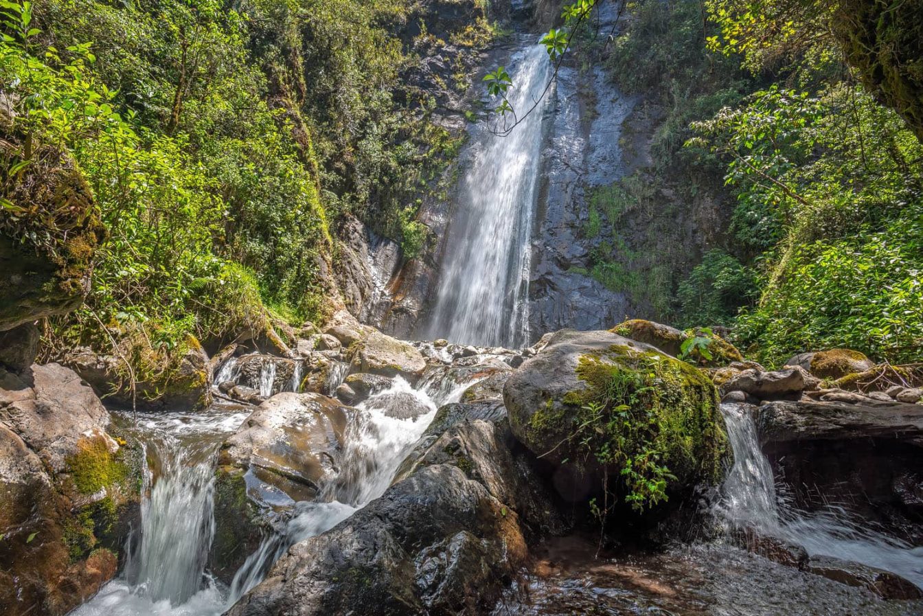 Photography of the beautiful hidden waterfall of Mundug in the Tungurahua province of Ecuador