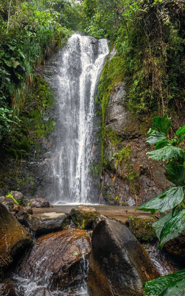 Photography of a tropical waterfall, Guaprapamba, whose water comes from the Guagua Pichincha Volcano